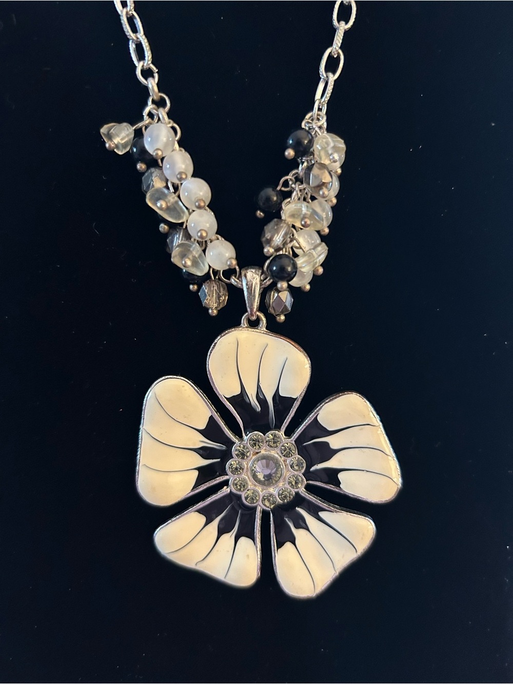 KENNETH COLE: Silver, Black and Cream Floral Pendant Necklace with Beaded Chain